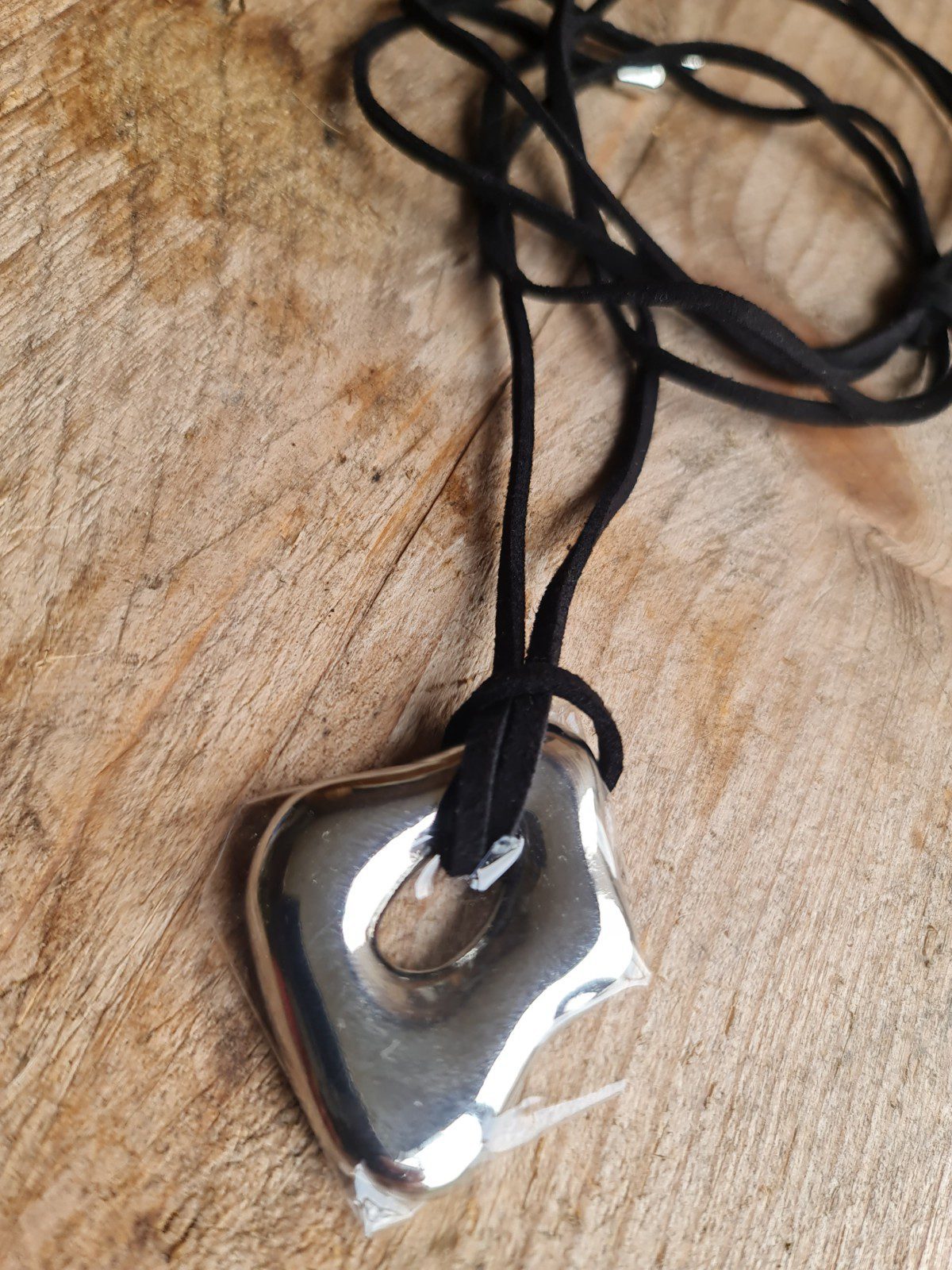 Stoere ketting van roestvrij staal met een fantasie ZILVER hanger - lange koord